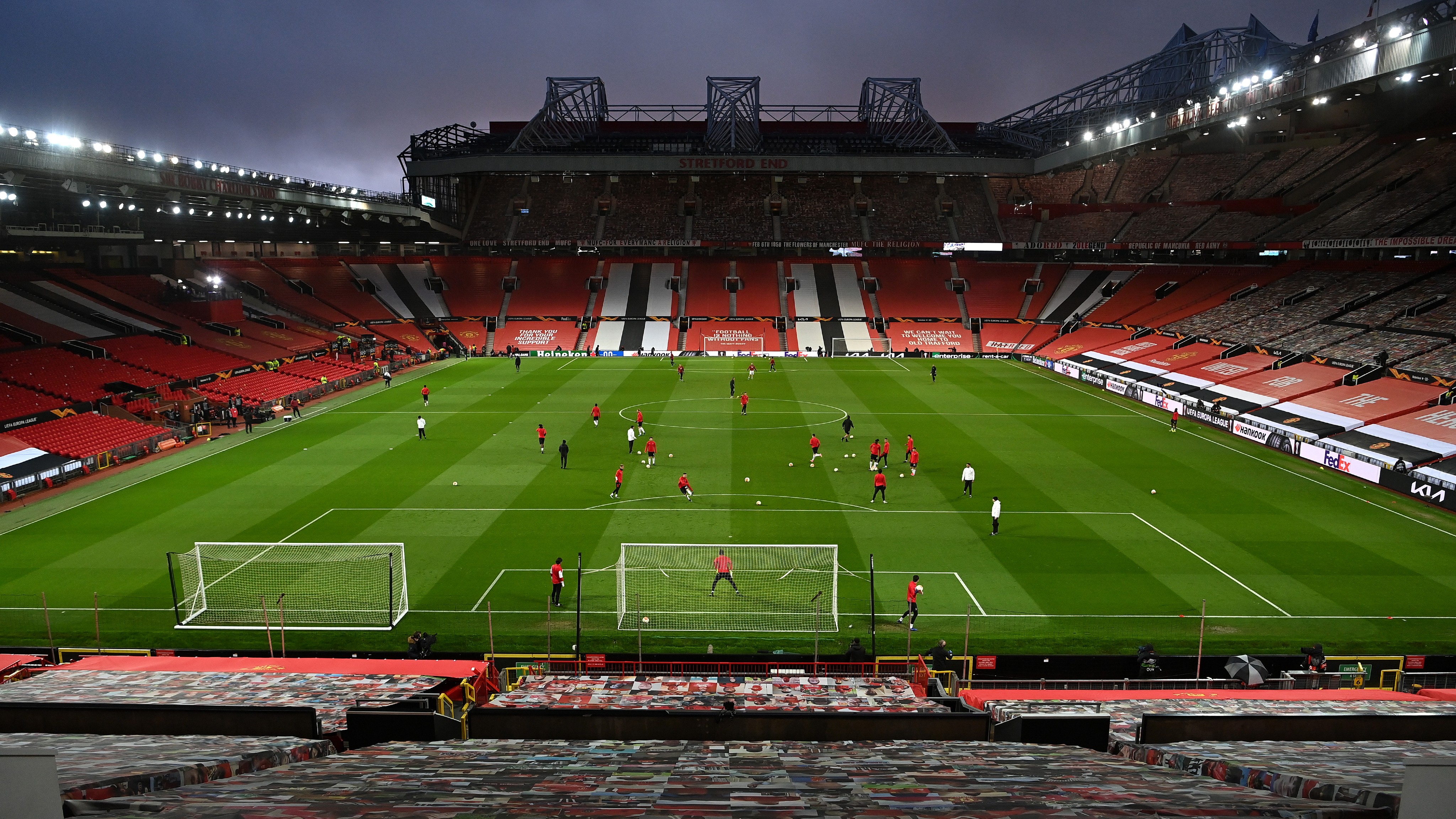 Old Trafford banners - red will be replaced with black (©Gallo Images)